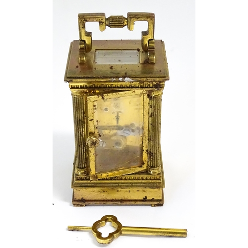 1401 - A Matthew Norman small brass carriage clock.  Approx 4 1/2