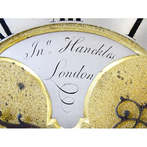 1405 - A late 18thC / early 19thC ebonised bracket clock. The silvered dial with strike/silent to the arch,... 