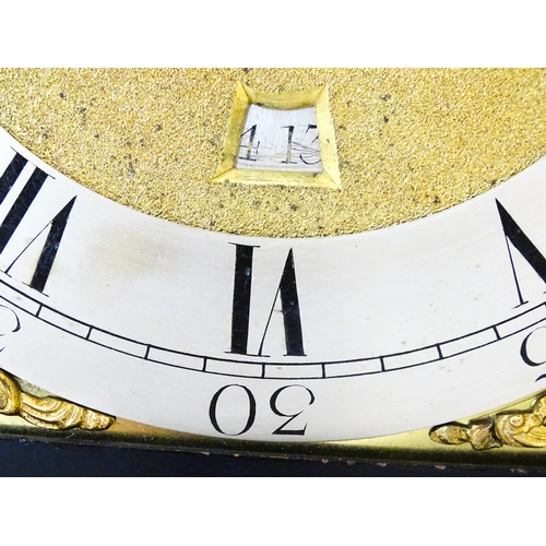 1405 - A late 18thC / early 19thC ebonised bracket clock. The silvered dial with strike/silent to the arch,... 