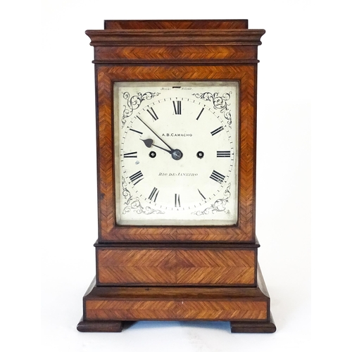 1408 - A 19thC library clock. The pained dial with Roman numerals signed 'A. B. Camacho ,  Rio De Janeiro',... 