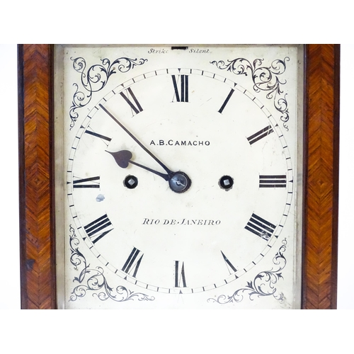 1408 - A 19thC library clock. The pained dial with Roman numerals signed 'A. B. Camacho ,  Rio De Janeiro',... 