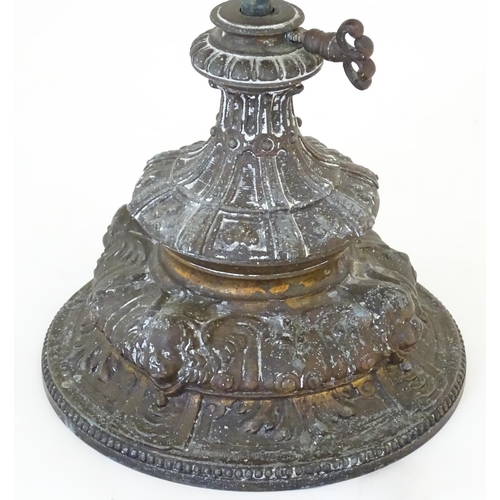 1421 - A Victorian oil lamp, the adjustable height cast base with clear glass reservoir with etched shade w... 