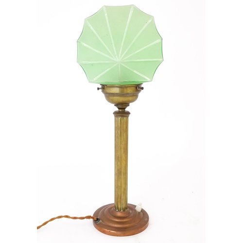 1423 - An Art Deco copper and brass table lamp with green glass shade. Approx. 18