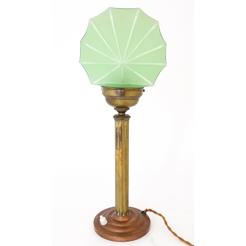 1423 - An Art Deco copper and brass table lamp with green glass shade. Approx. 18