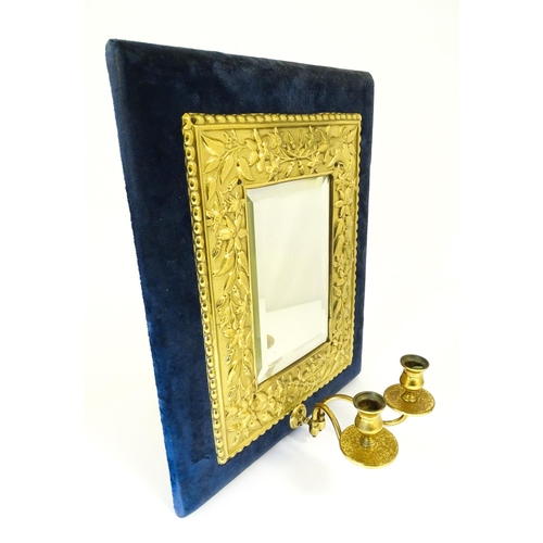 1427 - A 20thC girandole the bevelled mirror with brass and velvet surround, with twin branches lower. Appr... 