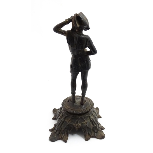 1002 - An early 20thC cast sculpture modelled as a young man, raised on an Art Nouveau base with foliate de... 