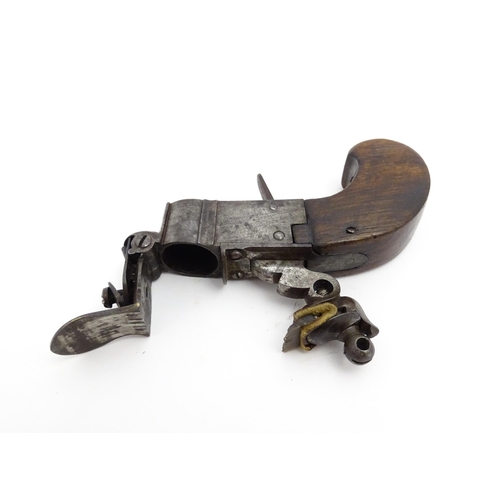 1195 - A 19thC tinder box lighter in the form of a flintlock pocket pistol, the lock with folding trigger, ... 