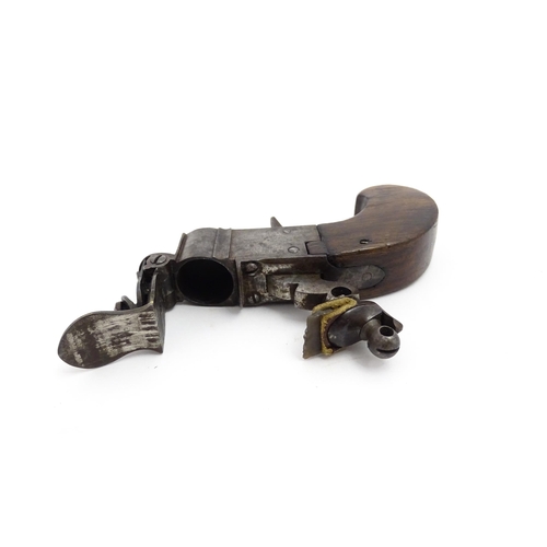 1195 - A 19thC tinder box lighter in the form of a flintlock pocket pistol, the lock with folding trigger, ... 