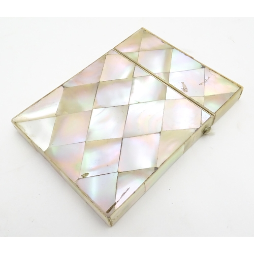 1205 - A Victorian mother of pearl card case of rectangular form. Approx. 4