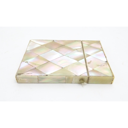 1205 - A Victorian mother of pearl card case of rectangular form. Approx. 4