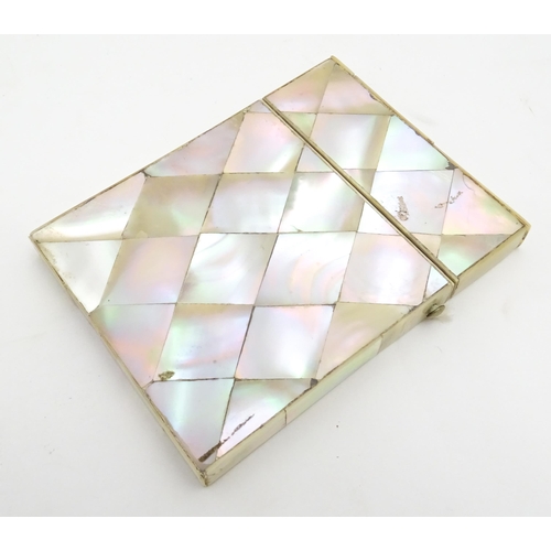 1205 - A Victorian mother of pearl card case of rectangular form. Approx. 4