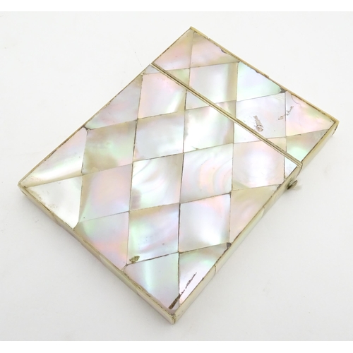 1205 - A Victorian mother of pearl card case of rectangular form. Approx. 4