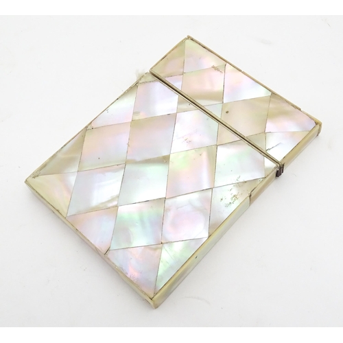 1205 - A Victorian mother of pearl card case of rectangular form. Approx. 4