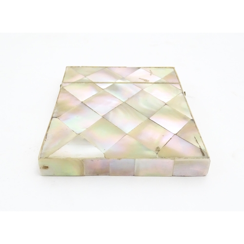 1205 - A Victorian mother of pearl card case of rectangular form. Approx. 4