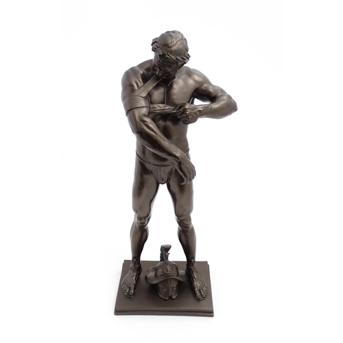 1241 - A 20thC bronzed resin sculpture after Brian Elton depicting a Roman gladiator / warrior wearing a cr... 