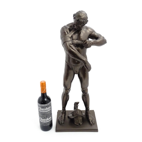 1241 - A 20thC bronzed resin sculpture after Brian Elton depicting a Roman gladiator / warrior wearing a cr... 