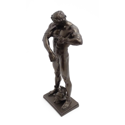 1241 - A 20thC bronzed resin sculpture after Brian Elton depicting a Roman gladiator / warrior wearing a cr... 