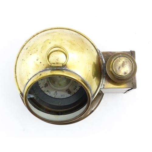 1246 - Nautical / Maritime Interest: An early 20thC brass ship's binnacle compass, with fitted lamp box to ... 