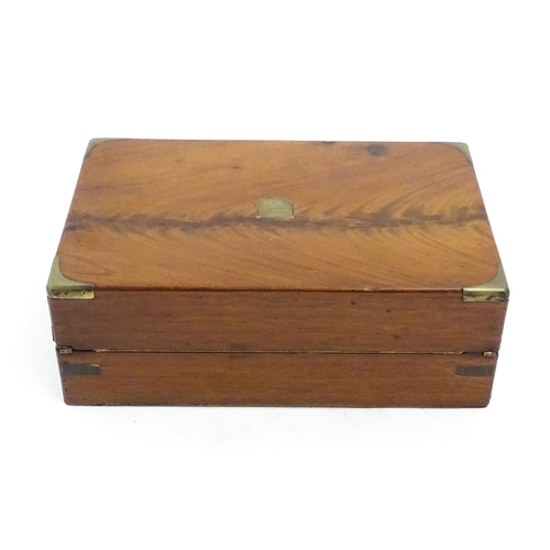 1248 - A 19thC brass bound mahogany writing slope opening to reveal a fitted interior. Approx. 5