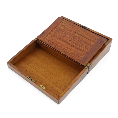 1248 - A 19thC brass bound mahogany writing slope opening to reveal a fitted interior. Approx. 5