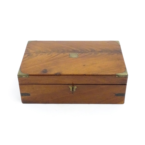 1248 - A 19thC brass bound mahogany writing slope opening to reveal a fitted interior. Approx. 5