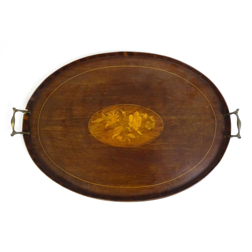 1259 - Two late 19thC twin handled mahogany trays with marquetry inlay to centre, to include a kidney shape... 