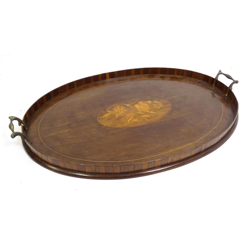 1259 - Two late 19thC twin handled mahogany trays with marquetry inlay to centre, to include a kidney shape... 