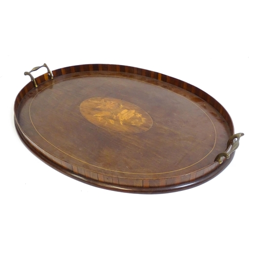 1259 - Two late 19thC twin handled mahogany trays with marquetry inlay to centre, to include a kidney shape... 