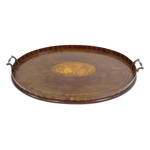 1259 - Two late 19thC twin handled mahogany trays with marquetry inlay to centre, to include a kidney shape... 