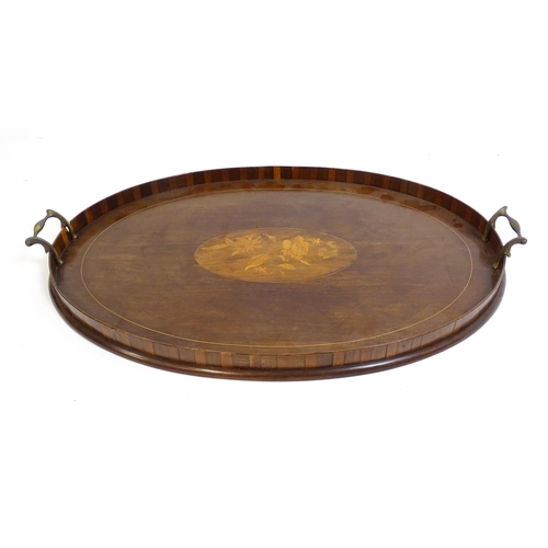 1259 - Two late 19thC twin handled mahogany trays with marquetry inlay to centre, to include a kidney shape... 