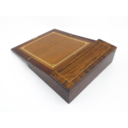 1262 - A late 19th / early 20thC rosewood writing slope with satinwood stringing. Approx. 4 1/4