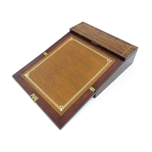 1262 - A late 19th / early 20thC rosewood writing slope with satinwood stringing. Approx. 4 1/4