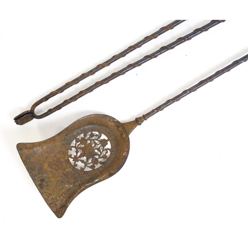 1269 - Two 20thC cast fire tools with twist detail comprising tongs and shovel. Tongs approx. 30