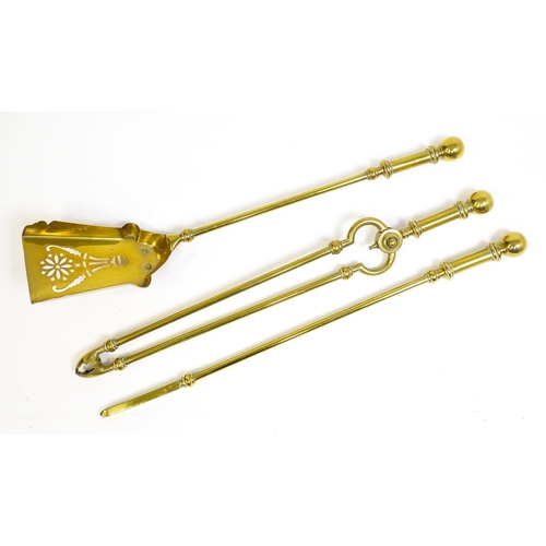 1270 - A 20thC brass fireside companion set comprising a pair of shaped stands, poker, tongs and shovel. Fi... 