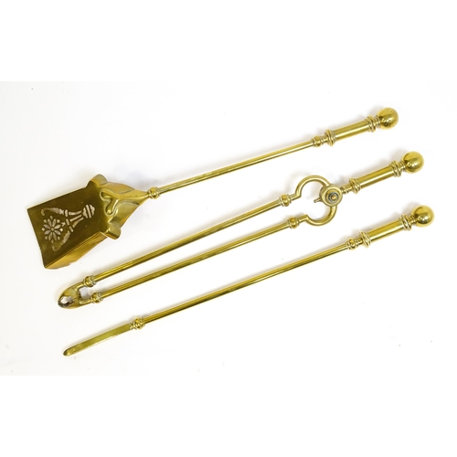 1270 - A 20thC brass fireside companion set comprising a pair of shaped stands, poker, tongs and shovel. Fi... 