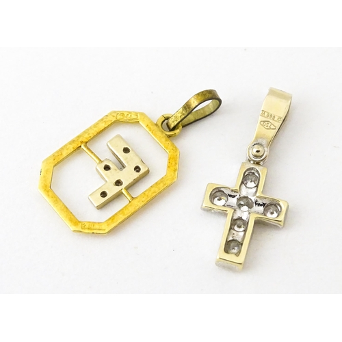 683 - An 18ct gold pendant with letter F to centre having diamond detail. Together with a cross form penda... 