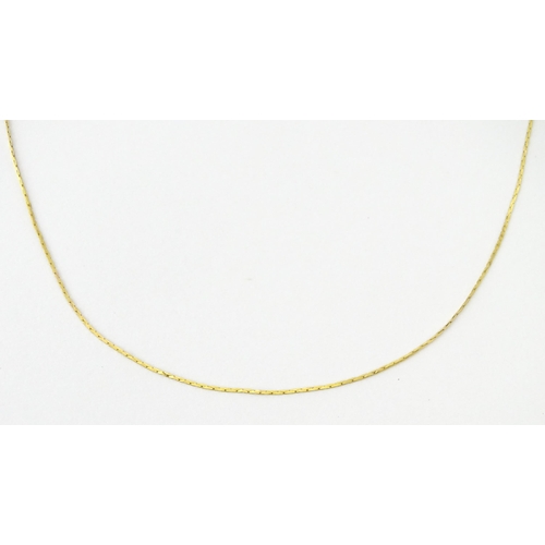 693 - A 9ct gold chain necklace. Together with another. Both approx. 16