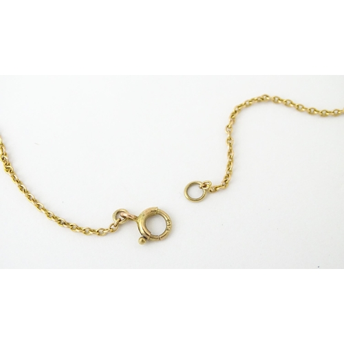 693 - A 9ct gold chain necklace. Together with another. Both approx. 16