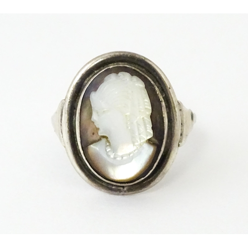 695 - A Continental .800 silver suite of jewellery with mother of pearl carved cameo detail comprising ear... 