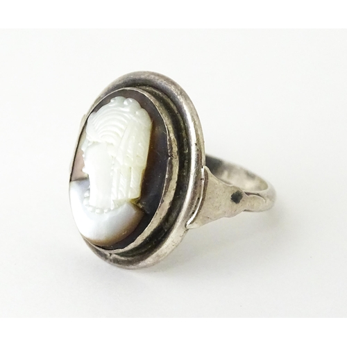 695 - A Continental .800 silver suite of jewellery with mother of pearl carved cameo detail comprising ear... 