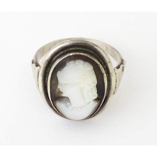 695 - A Continental .800 silver suite of jewellery with mother of pearl carved cameo detail comprising ear... 