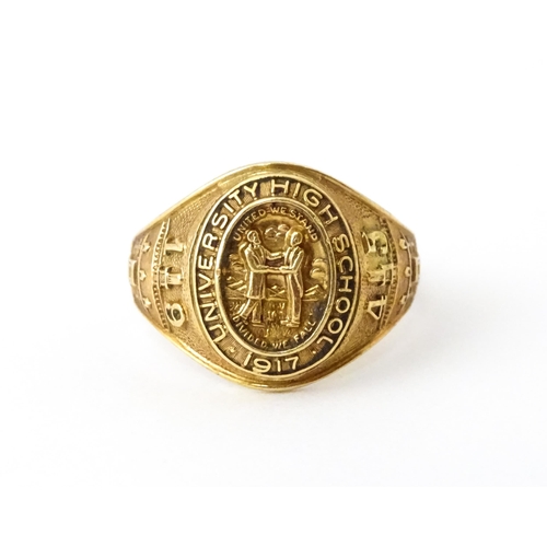 722 - An American 10k gold school ring for ' University High School' bearing motto United we stand divided... 