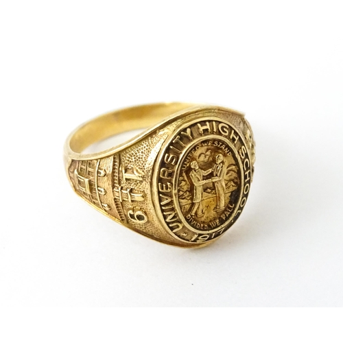 722 - An American 10k gold school ring for ' University High School' bearing motto United we stand divided... 