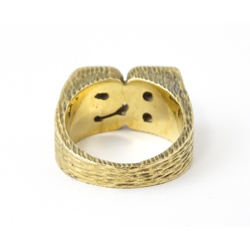 726 - A 9ct gold ring formed as the initials 'BS'. Ring size approx. N 1/2  (14g)