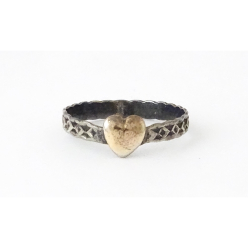 727 - A Charles Horner silver ring. Together with a silver chain and white metal pendant. Ring size approx... 