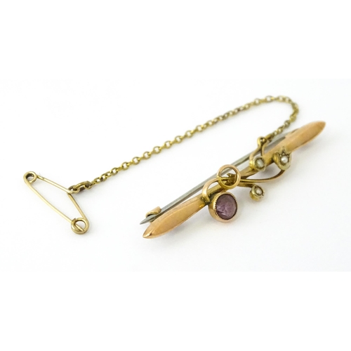 730 - A 9ct gold brooch set with amethyst with seed pearls. Together with a ring set  with amethyst and ma... 