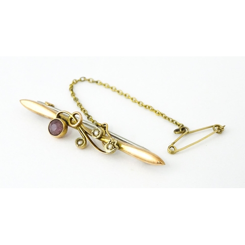 730 - A 9ct gold brooch set with amethyst with seed pearls. Together with a ring set  with amethyst and ma... 