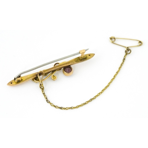 730 - A 9ct gold brooch set with amethyst with seed pearls. Together with a ring set  with amethyst and ma... 