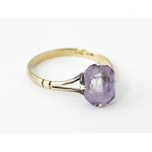 730 - A 9ct gold brooch set with amethyst with seed pearls. Together with a ring set  with amethyst and ma... 