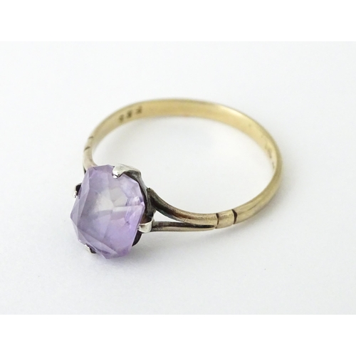 730 - A 9ct gold brooch set with amethyst with seed pearls. Together with a ring set  with amethyst and ma... 